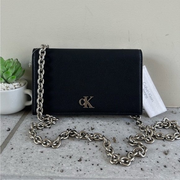 Calvin Klein Handbags - NWT Calvin Klein Minimal Monogram Chain Strap Wallet
